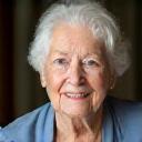 Portrait of Anna Schmidt, a smiling senior woman.